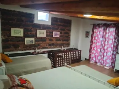 Letto o letti in una camera di MuSa Apartment