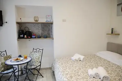 Letto o letti in una camera di Casa Barbara 15-17