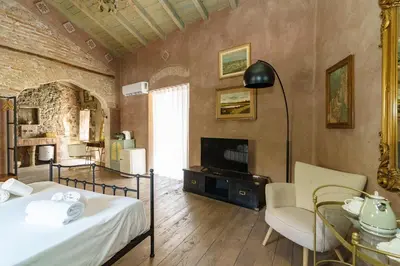Letto o letti in una camera di Casa delle Belle