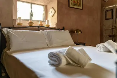 Letto o letti in una camera di Casa delle Belle