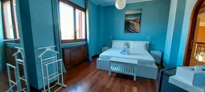 Letto o letti in una camera di Villa Giulia