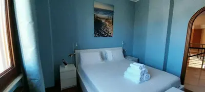 Letto o letti in una camera di Villa Giulia