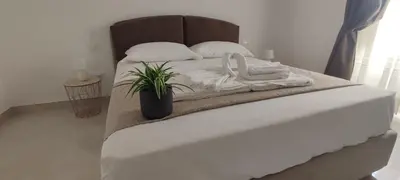 Letto o letti in una camera di FeVi Rooms
