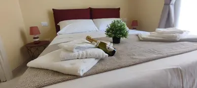 Letto o letti in una camera di FeVi Rooms