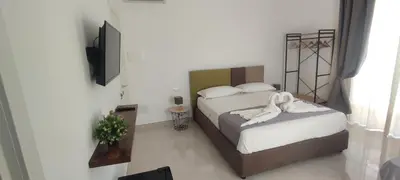 Letto o letti in una camera di FeVi Rooms