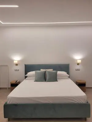 Letto o letti in una camera di Trinacria Luxury B&B