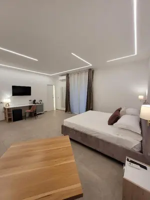 Letto o letti in una camera di Trinacria Luxury B&B
