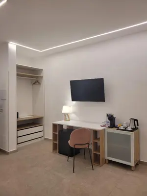 TV o dispositivi per l'intrattenimento presso Trinacria Luxury B&B