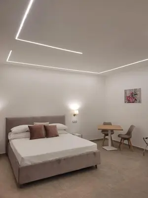 Letto o letti in una camera di Trinacria Luxury B&B