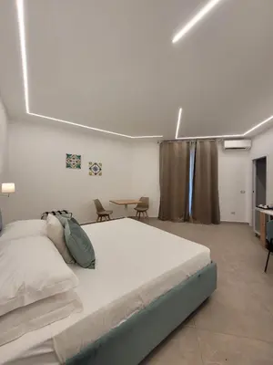 Letto o letti in una camera di Trinacria Luxury B&B