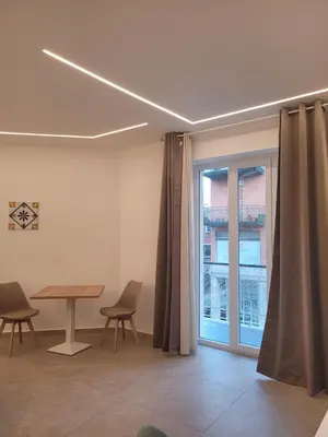 Area soggiorno di Trinacria Luxury B&B