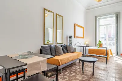Area soggiorno di GuestHost - Elegant Apartment near Castello Ursino
