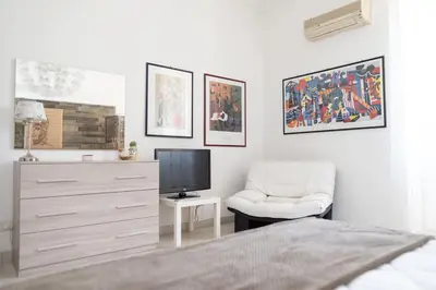 Letto o letti in una camera di Casa Andromaca