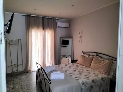 Letto o letti in una camera di Amuri