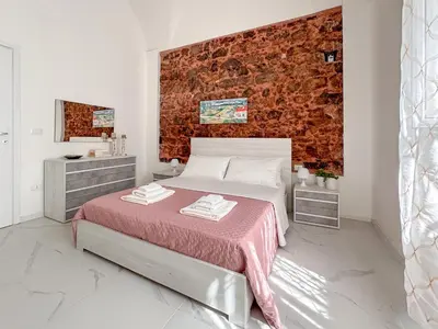 Letto o letti in una camera di Le 3 gemme