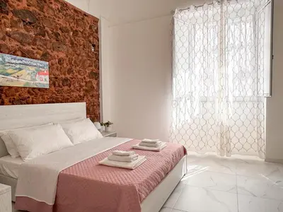 Letto o letti in una camera di Le 3 gemme