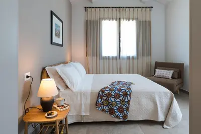 Letto o letti in una camera di Villa Paolina