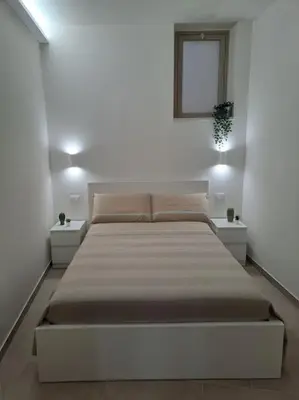 Letto o letti in una camera di A Casuzza