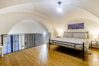 Letto o letti in una camera di Dimora San C r i s t o f o r o