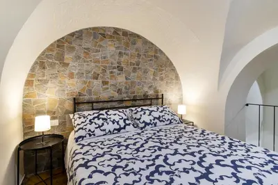 Letto o letti in una camera di Dimora San C r i s t o f o r o