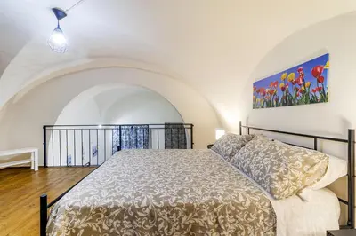 Letto o letti in una camera di Dimora San C r i s t o f o r o