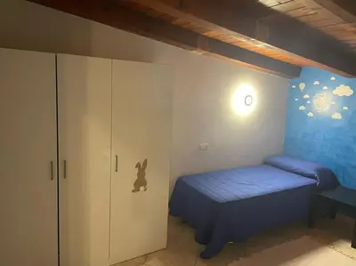 Letto o letti in una camera di Domus Zeus