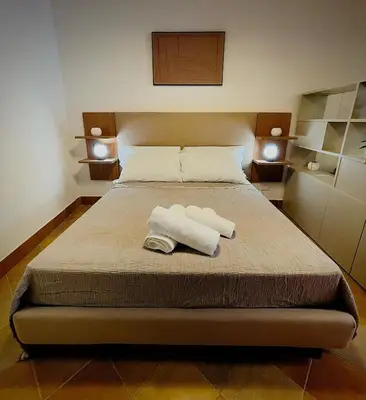 Letto o letti in una camera di La Casetta Di Simona