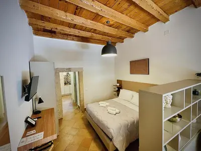 Letto o letti in una camera di La Casetta Di Simona
