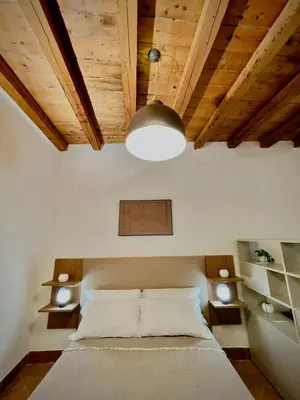 Letto o letti in una camera di La Casetta Di Simona