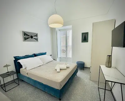 Letto o letti in una camera di La Casa Di Re Salomone