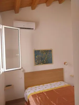 Letto o letti in una camera di La casa azzurra