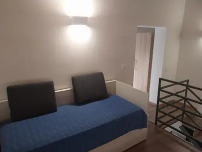 Letto o letti in una camera di La casa azzurra