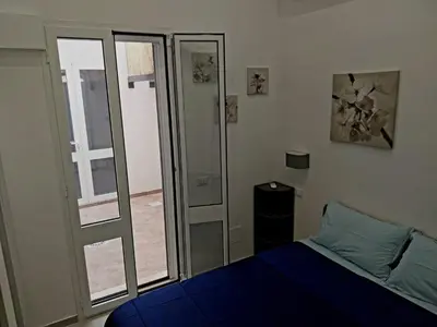 Letto o letti in una camera di La casa azzurra