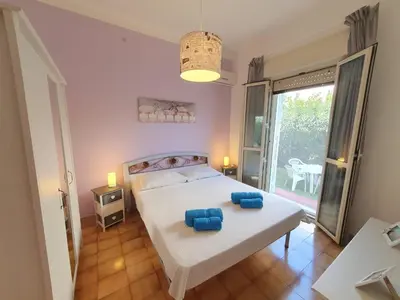 Letto o letti in una camera di Appartamenti Villa Augusta-del-Sol