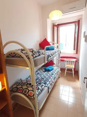 Letto o letti in una camera di Appartamenti Villa Augusta-del-Sol