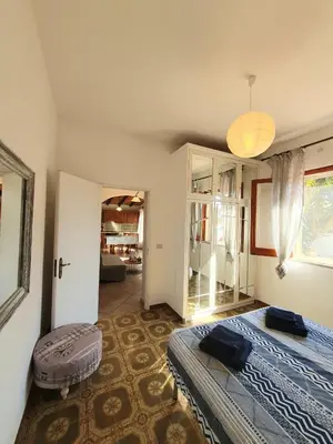 Letto o letti in una camera di Appartamenti Villa Augusta-del-Sol