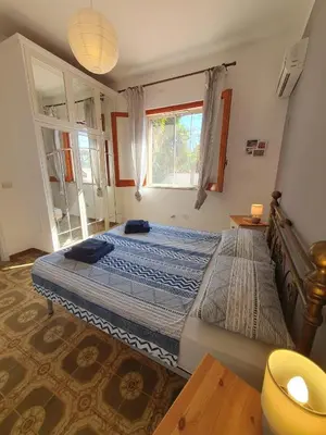 Letto o letti in una camera di Appartamenti Villa Augusta-del-Sol
