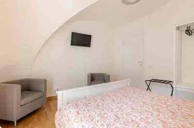 Letto o letti in una camera di San Martino House al Duomo