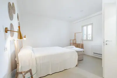 Letto o letti in una camera di Case Luparello