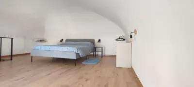 Letto o letti in una camera di Azzurra House