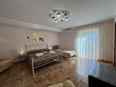 Letto o letti in una camera di A Rua Camera con bagno privato vicino al Duomo
