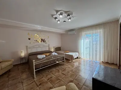 Letto o letti in una camera di A Rua Camera con bagno privato vicino al Duomo