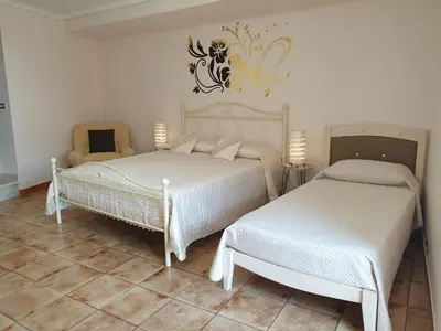 Letto o letti in una camera di A Rua Camera con bagno privato vicino al Duomo