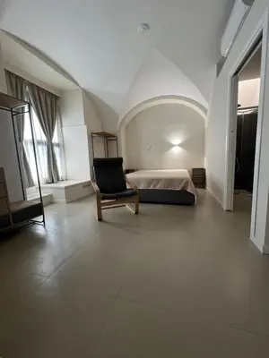 Letto o letti in una camera di Ursino house