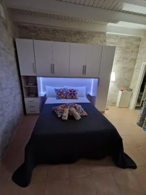 Letto o letti in una camera di Serena's House