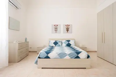 Letto o letti in una camera di Chez Dione