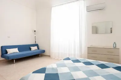 Letto o letti in una camera di Chez Dione