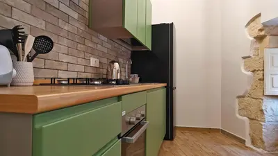 Cucina o angolo cottura di Il sussurro delle Nereidi, appartamento boho-chic a Siracusa