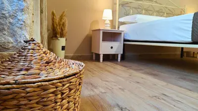 Letto o letti in una camera di Il sussurro delle Nereidi, appartamento boho-chic a Siracusa