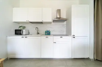 Cucina o angolo cottura di GuestHost - Borgo 84 Marzamemi - Nido sul Mare